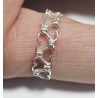 ANILLO DE PLATA CORAZONES.